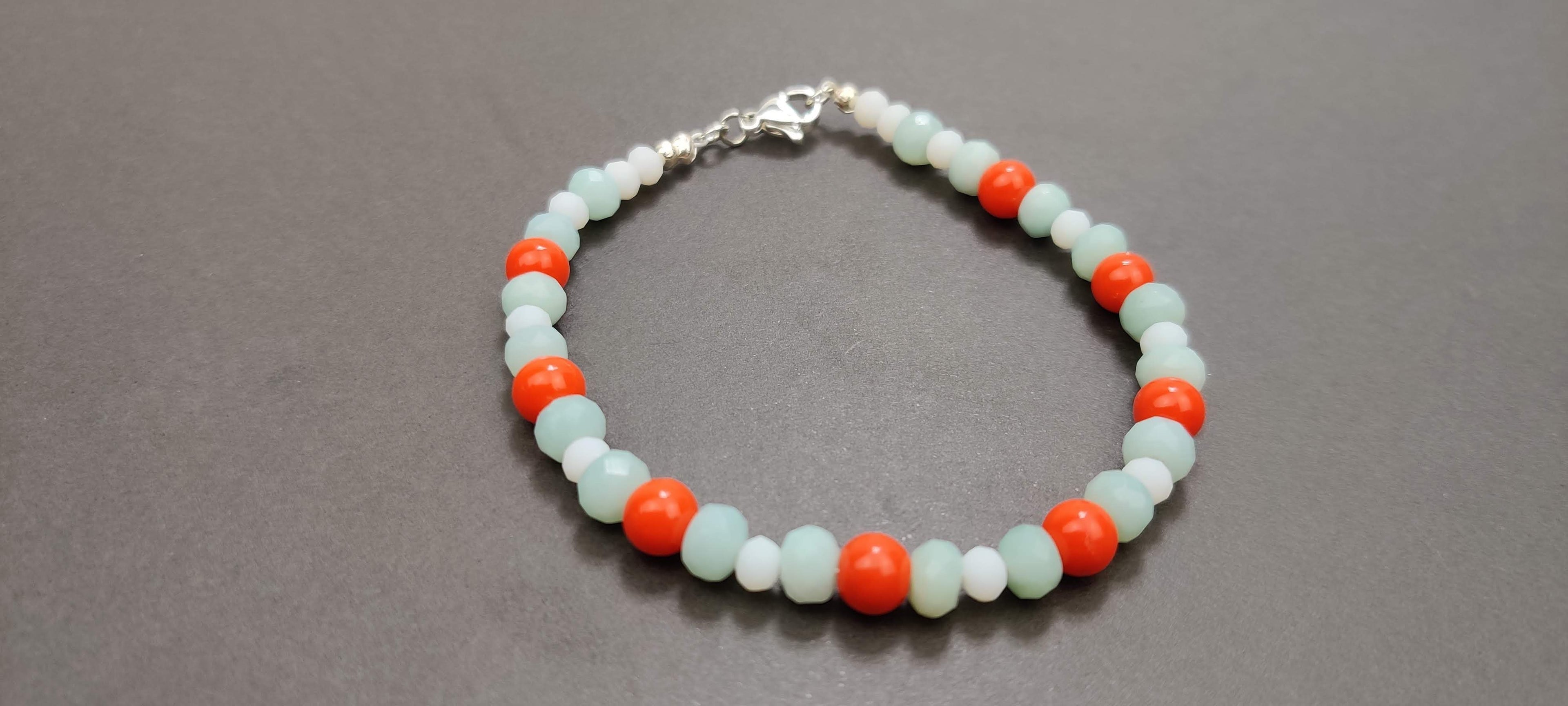 Orange, Light Blue, and White Glass Beads Bracelet