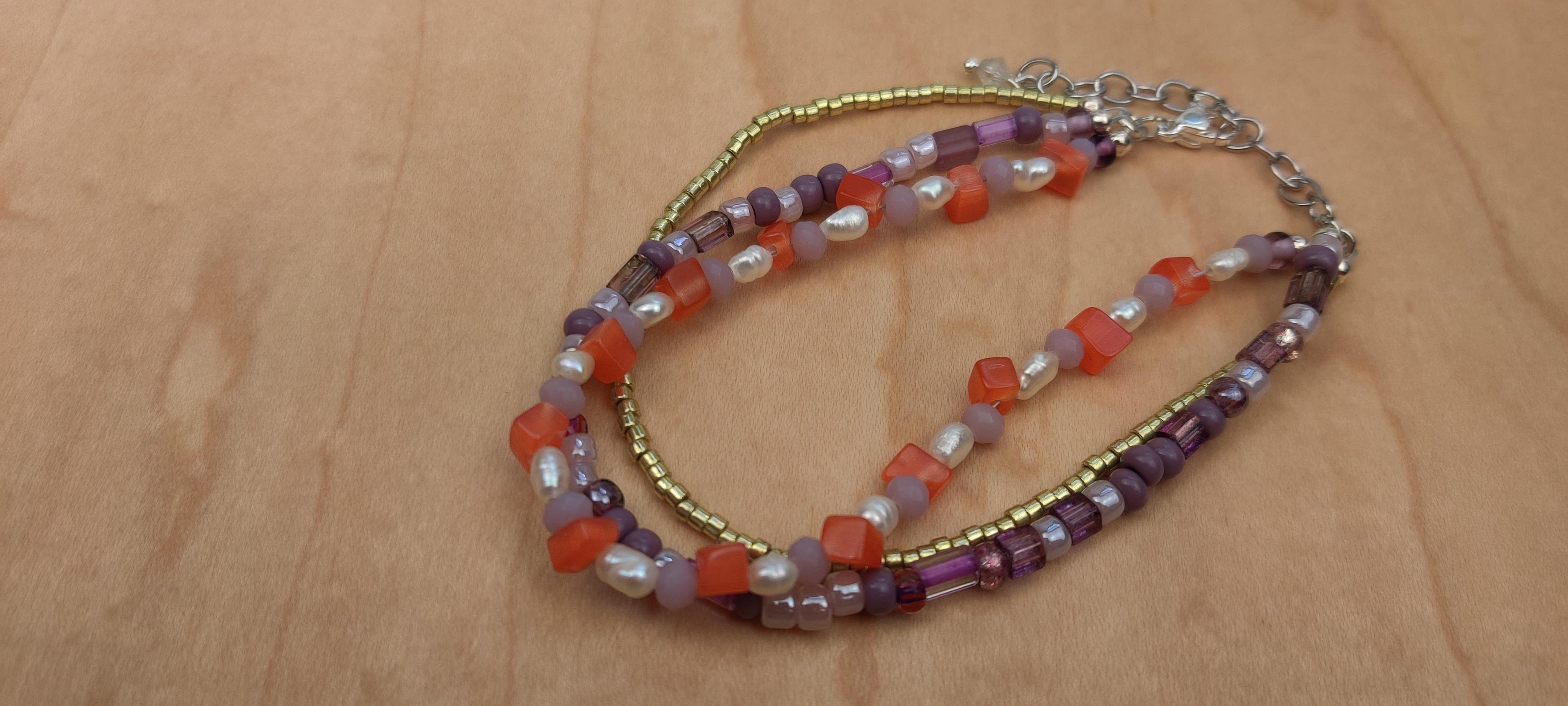 Three Strand Bracelet with Gold, Purple, Orange, and Freshwater Pearls Glass Beads
