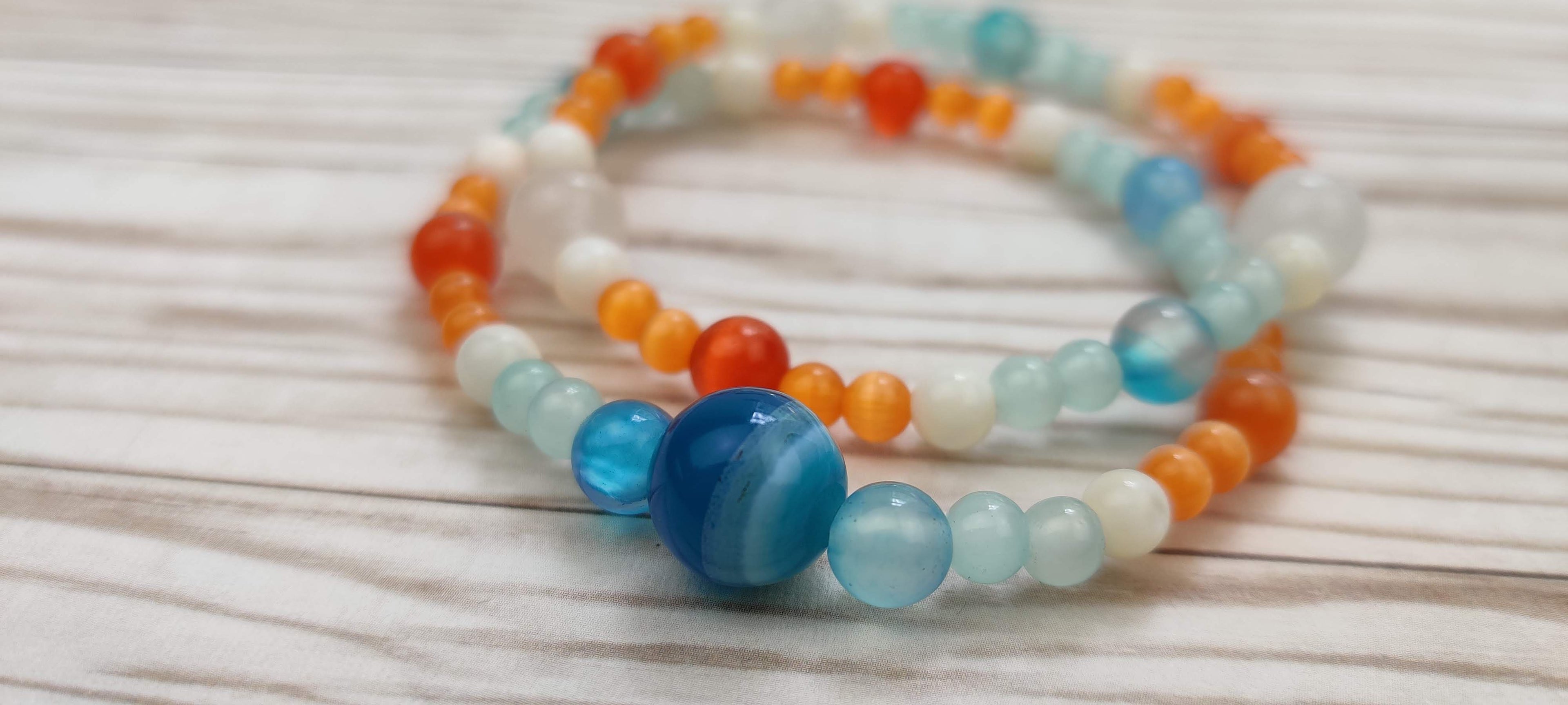 Two Natural Stones Bracelets in Blue, Orange, and White