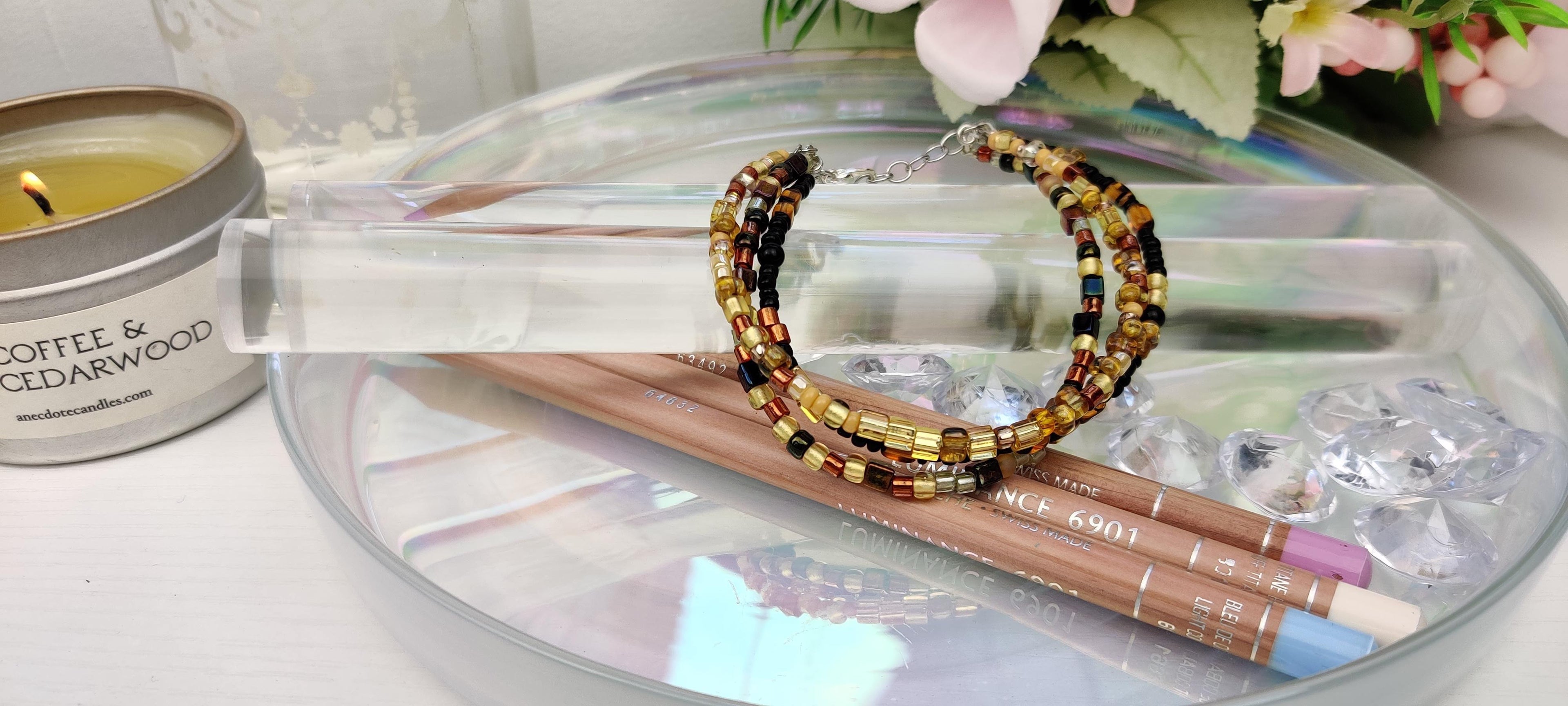 Three Strand Minimalist Bracelet with Gold, Brown, and Black Glass Beads