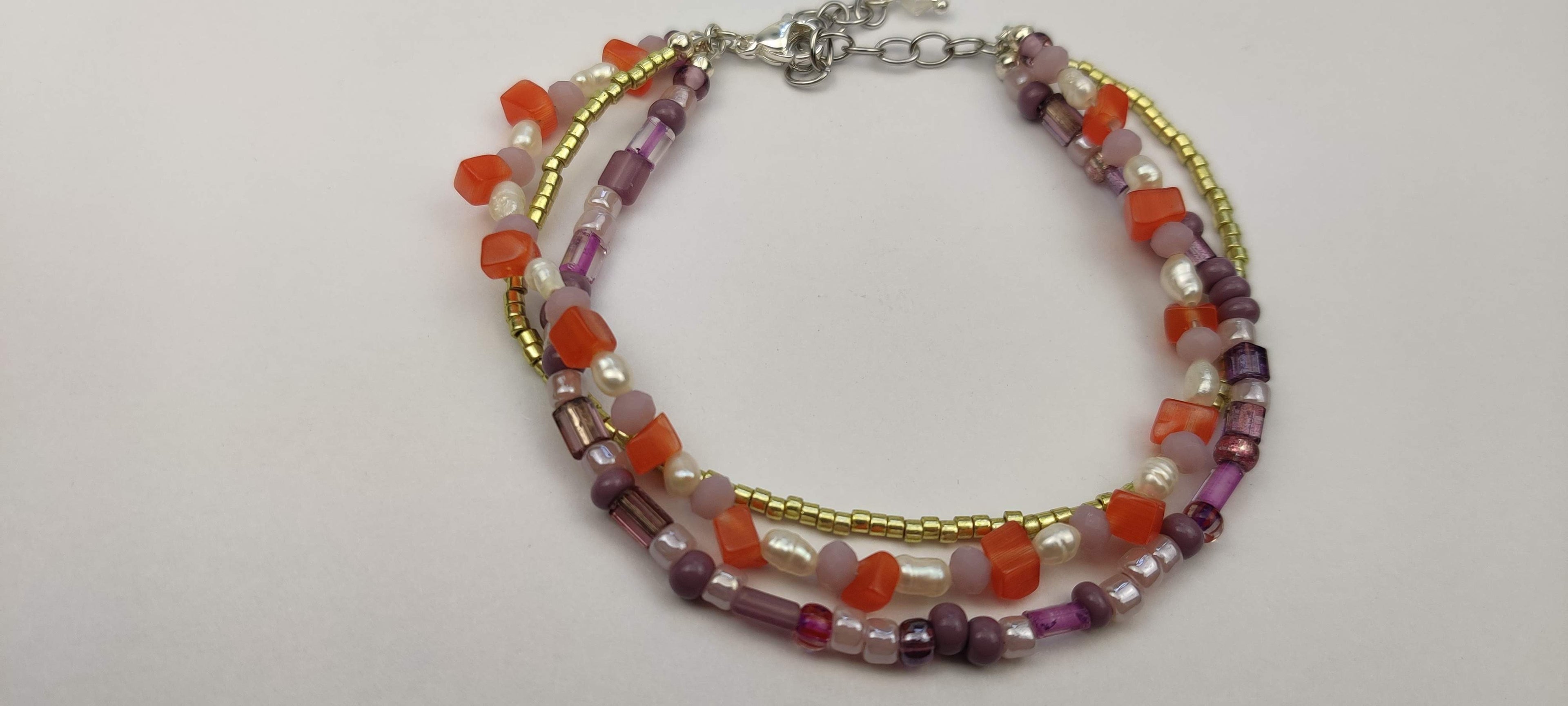 Three Strand Bracelet with Gold, Purple, Orange, and Freshwater Pearls Glass Beads