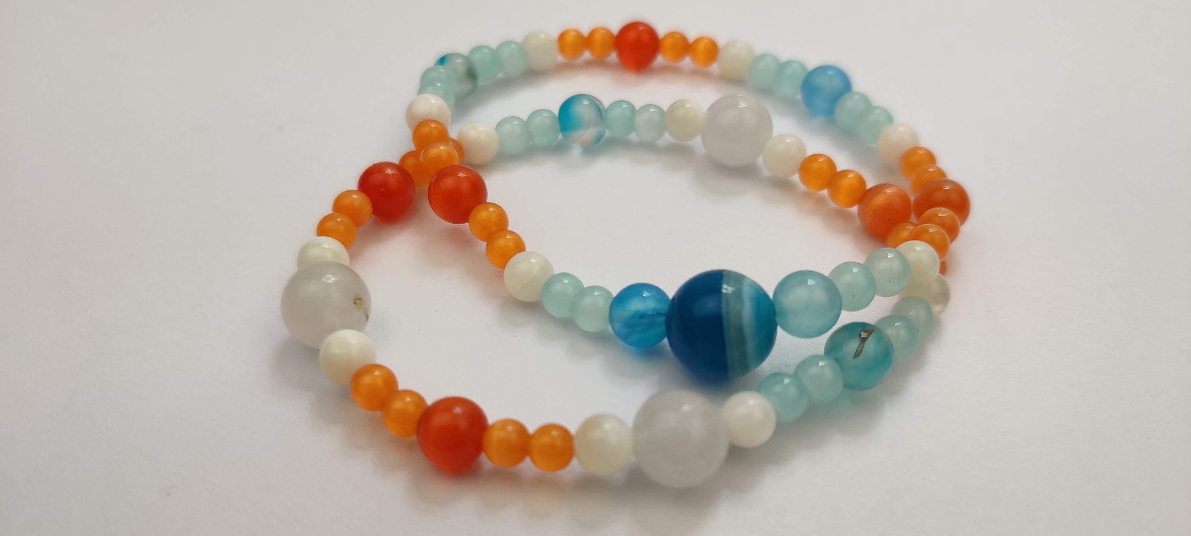 Two Natural Stones Bracelets in Blue, Orange, and White