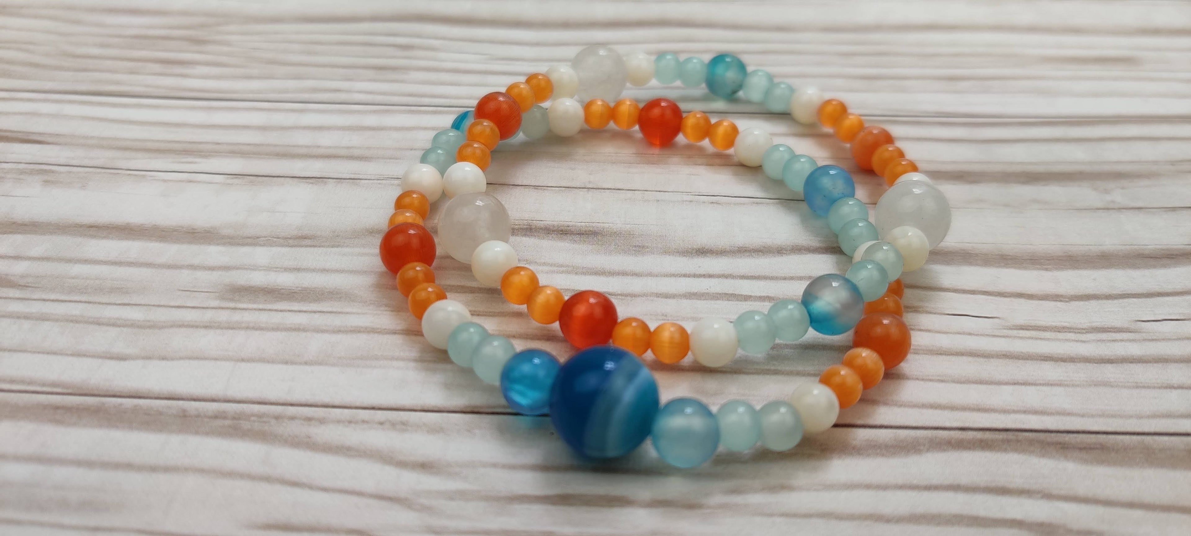 Two Natural Stones Bracelets in Blue, Orange, and White