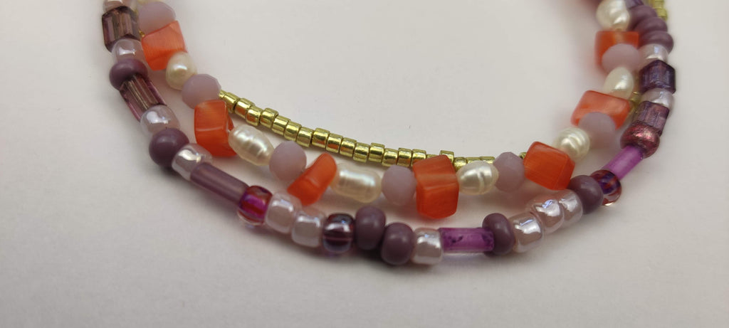 Three Strand Bracelet with Gold, Purple, Orange, and Freshwater Pearls Glass Beads