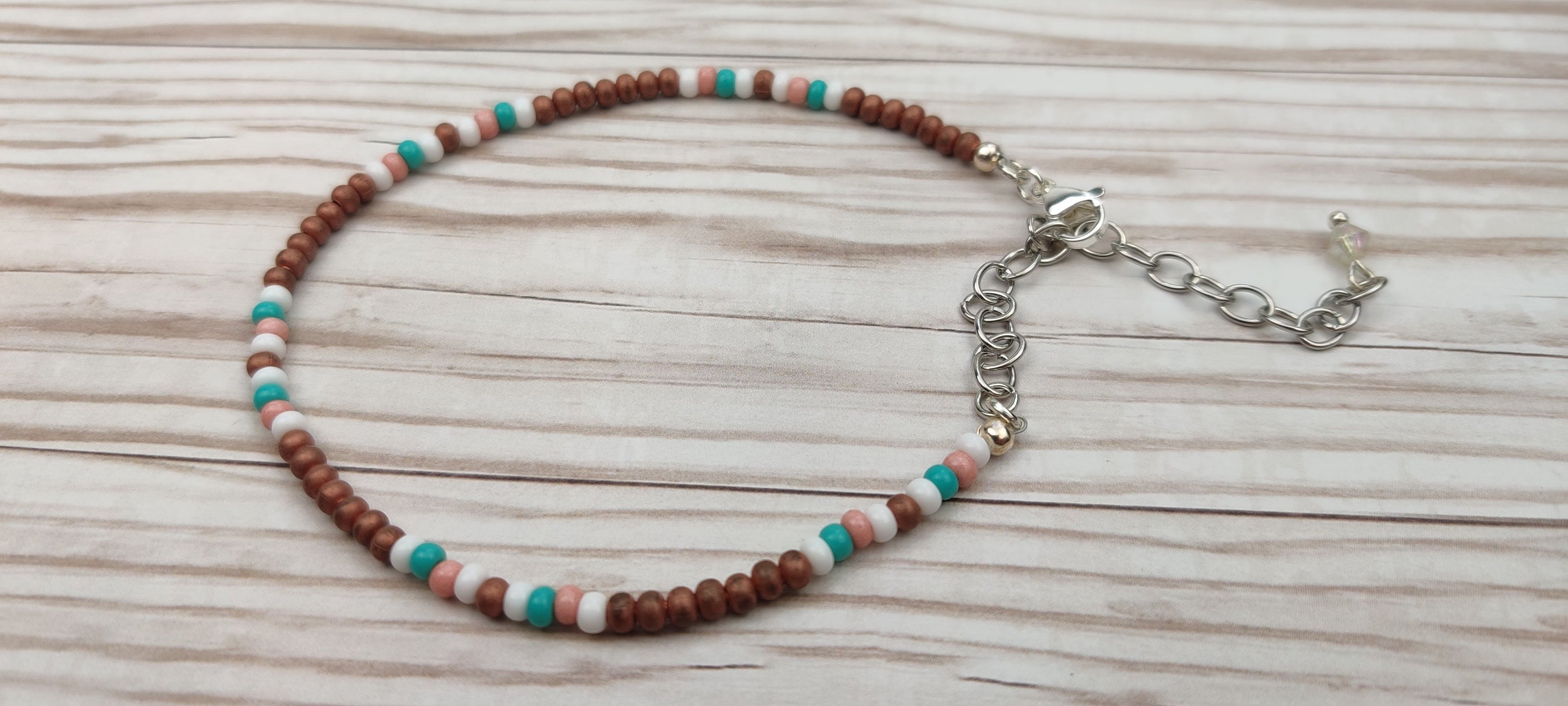 Minimalist Seed Beads Bracelet with Metal, Peach, Aqua, and White Beads