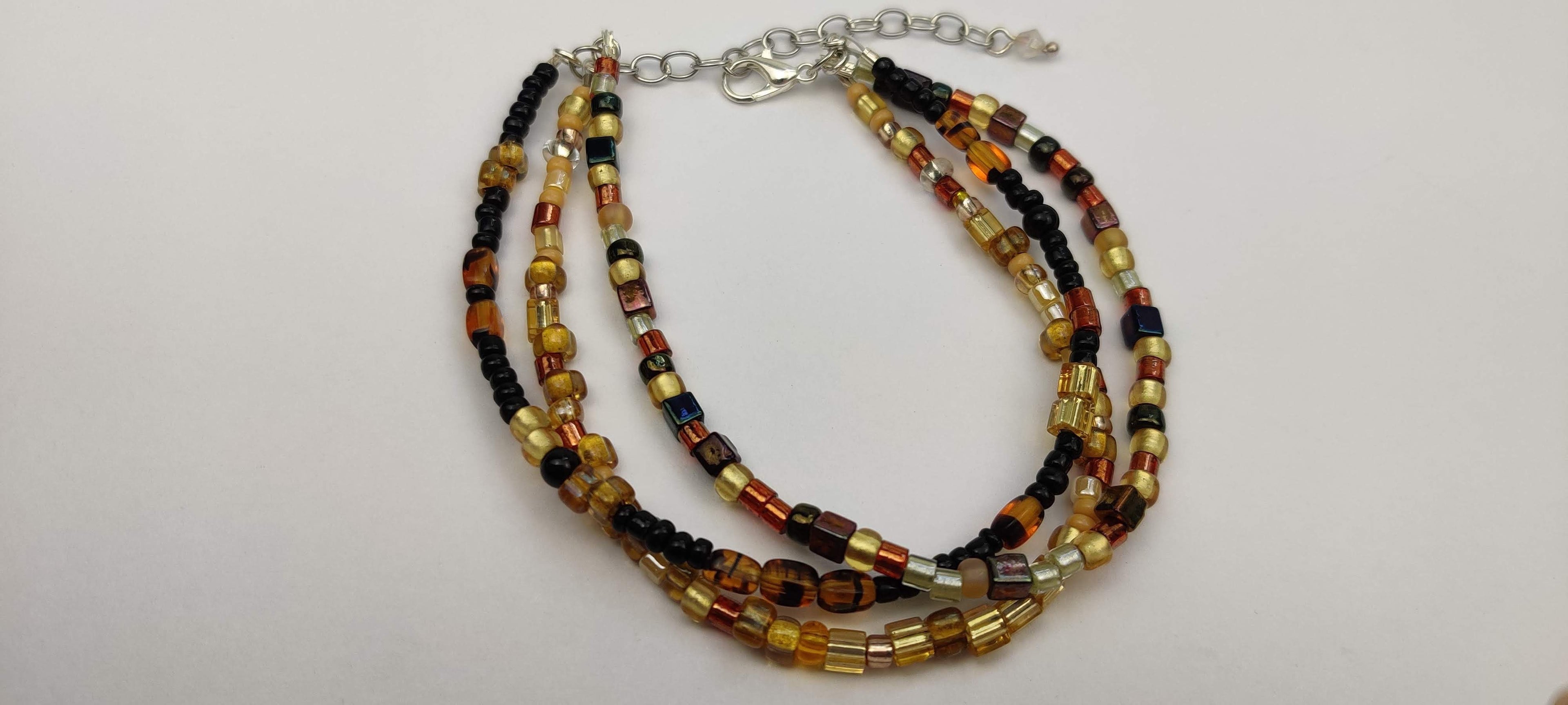 Three Strand Minimalist Bracelet with Gold, Brown, and Black Glass Beads