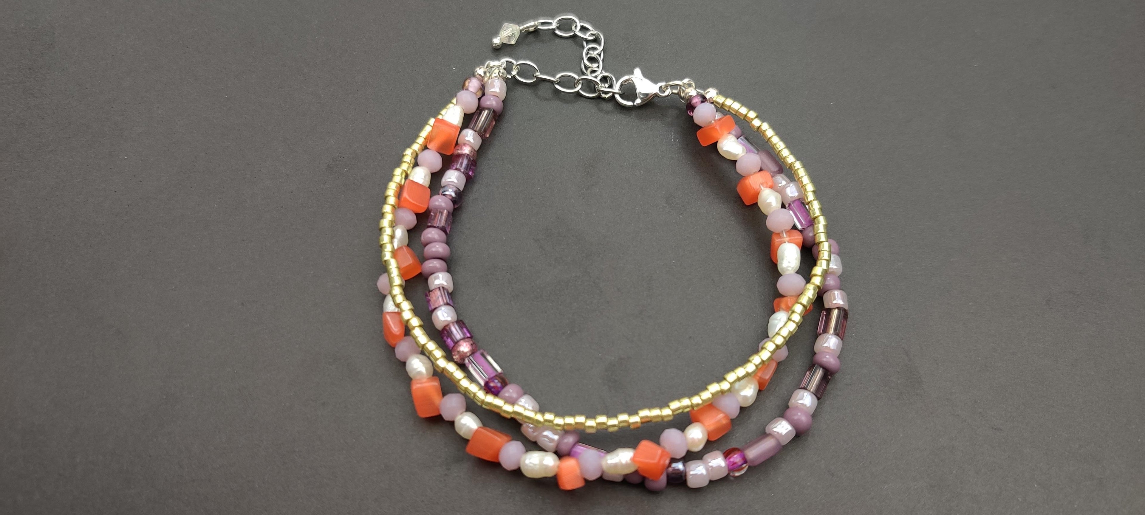 Three Strand Bracelet with Gold, Purple, Orange, and Freshwater Pearls Glass Beads