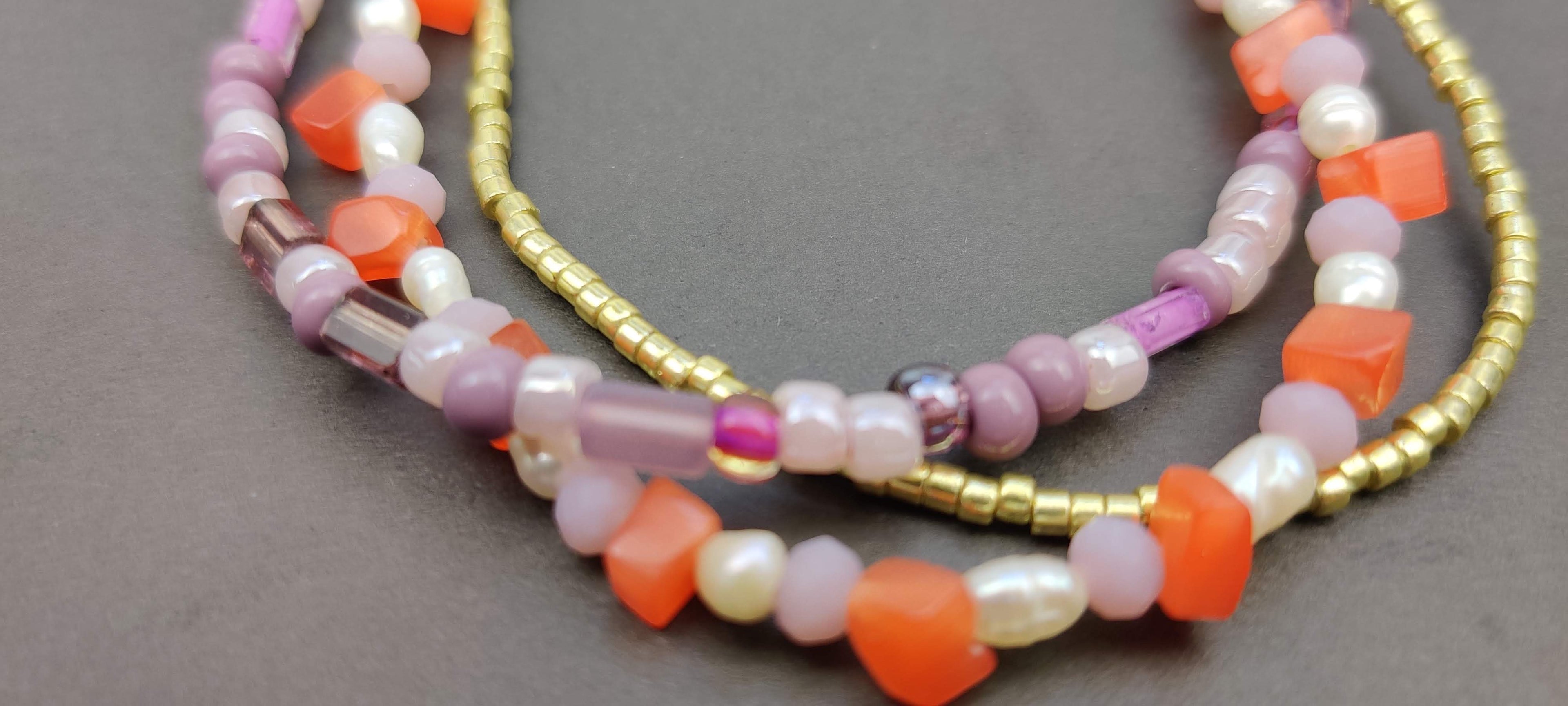 Three Strand Bracelet with Gold, Purple, Orange, and Freshwater Pearls Glass Beads