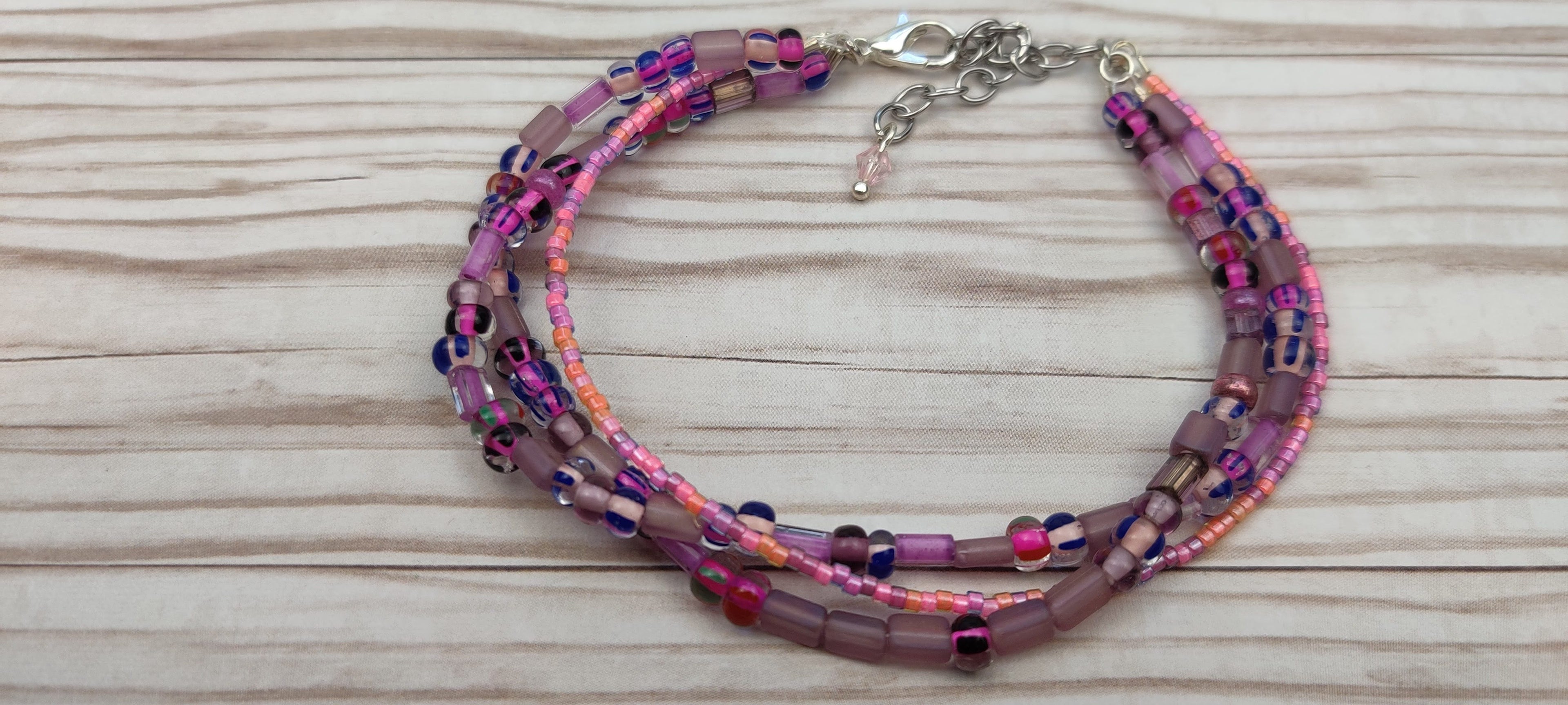 Three Strand Minimalist Bracelet with Purple and Pink Beads